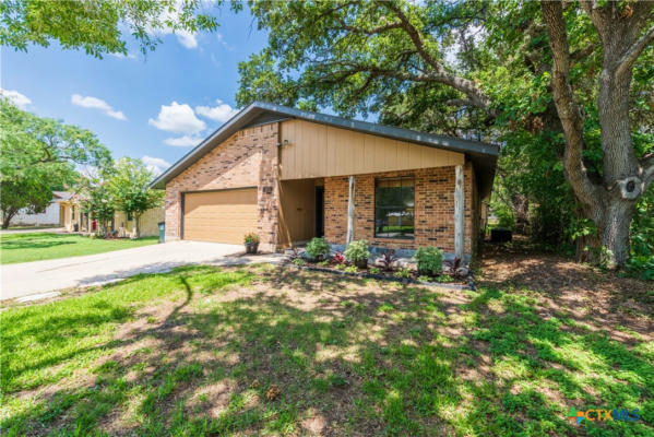 819 S PECAN AVE, LULING, TX 78648 - Image 1
